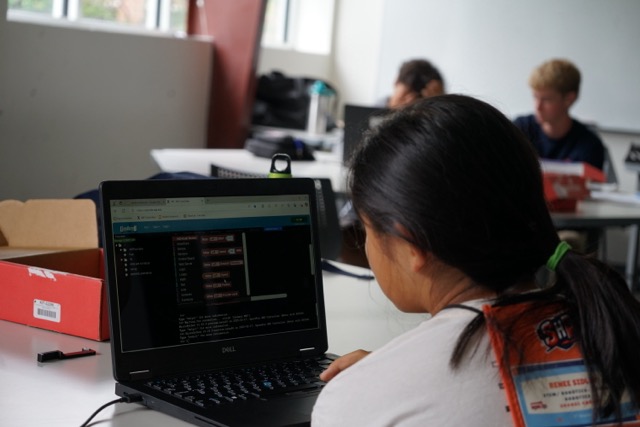 Student looking at a computer