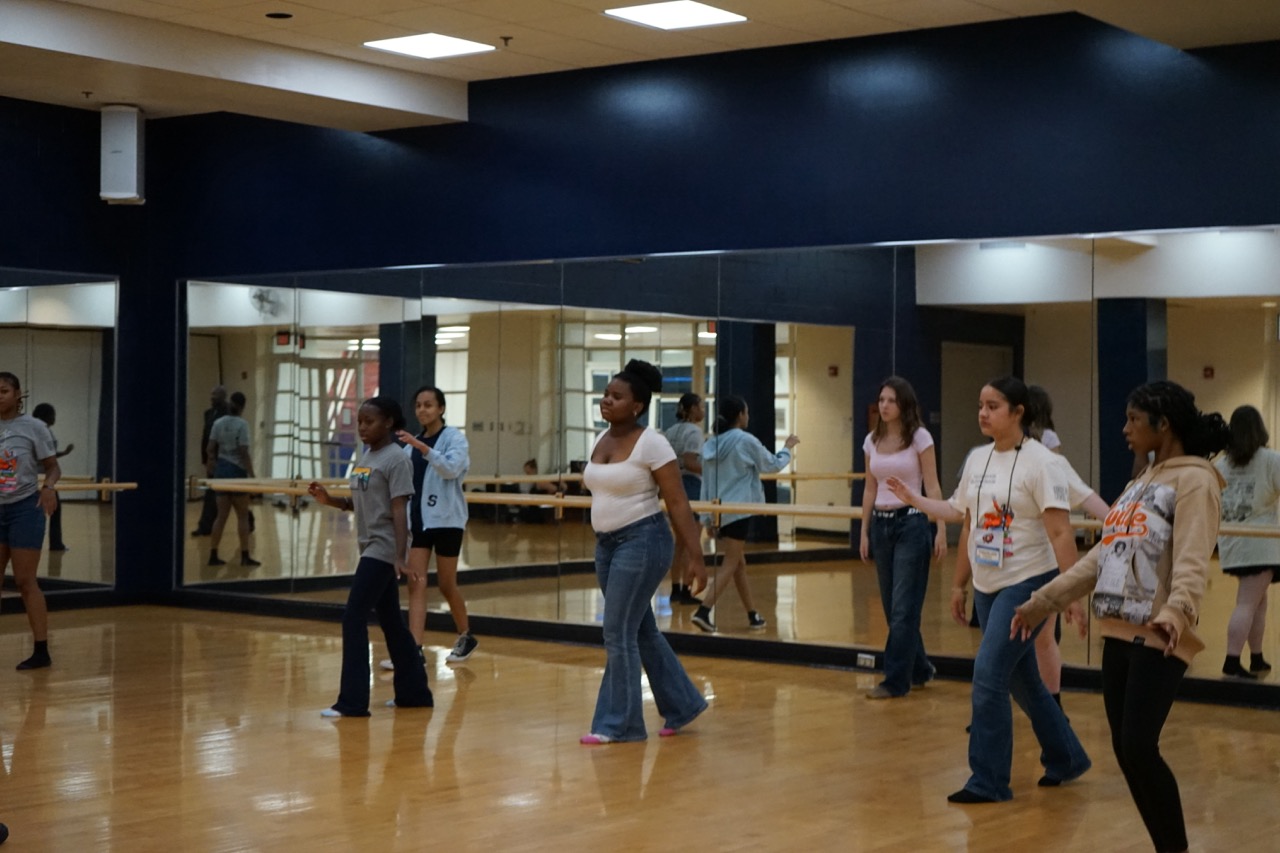 Students in front of a mirror