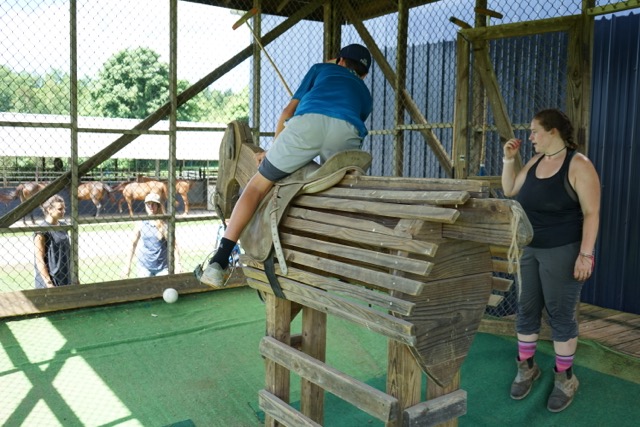 Student on a horse apparatus