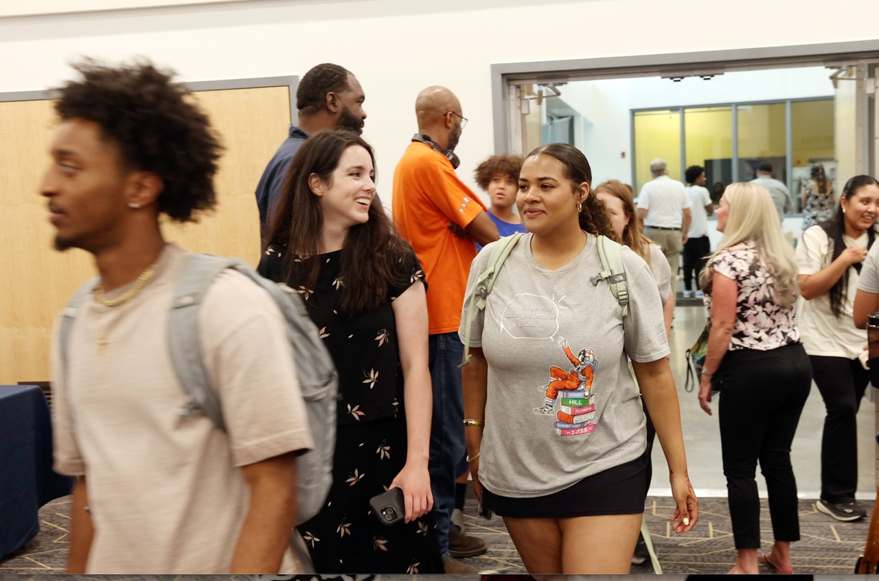 Students walking into a room