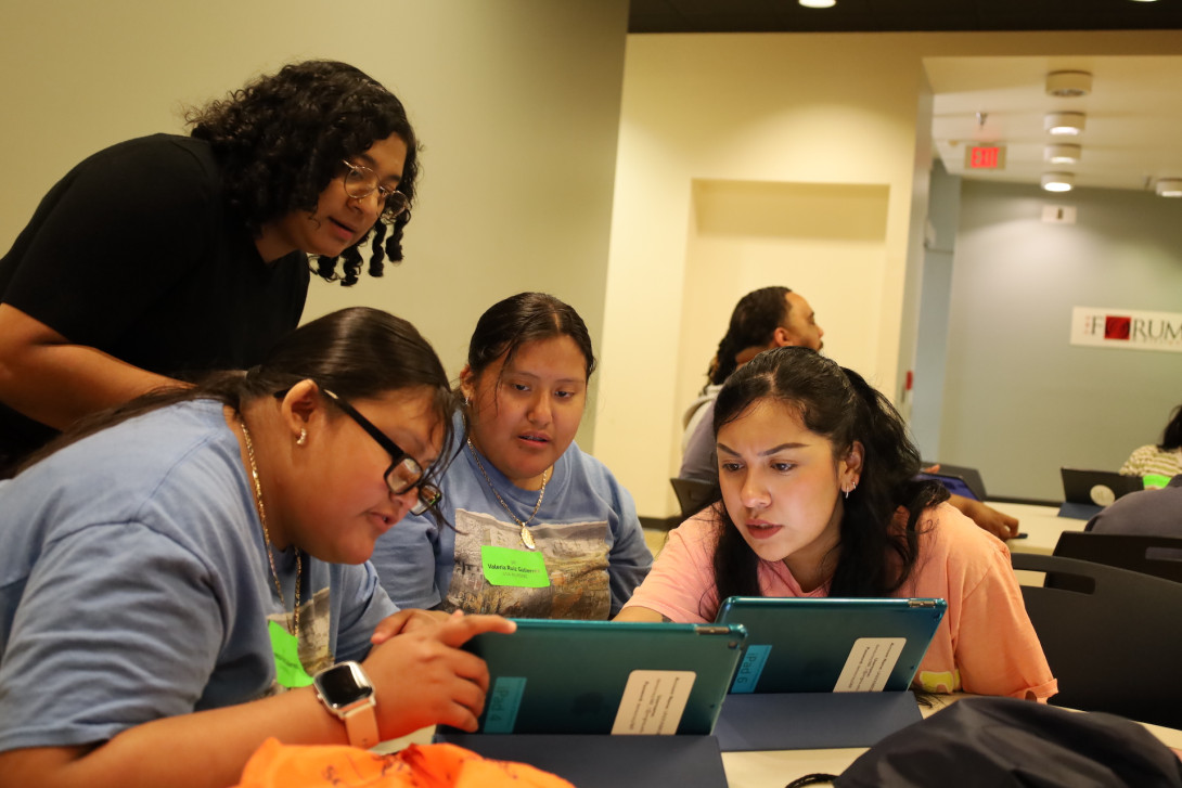 SHP Scholars and staff discuss a question during a daily wellness check-in.