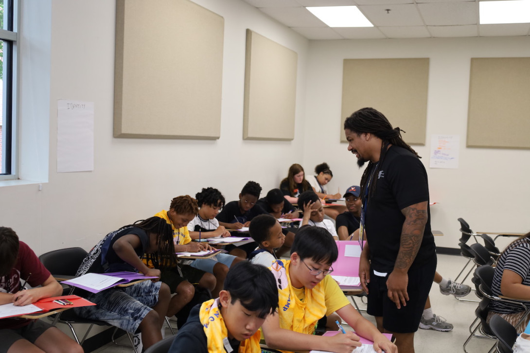 Counselor speaking with students